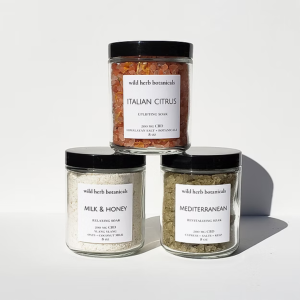 Wild Herb Botanicals Italian Citrus, Milk & Honey and Mediterranean CBD Salt Soak jars.