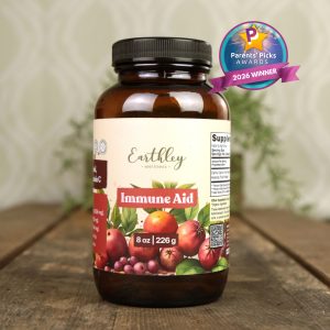 Earthley Wellness Immune Aid supplement jar with berry illustration and Parents' Picks 2026 Winner award badge