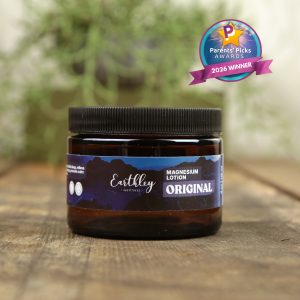 Earthley Original Magnesium Lotion jar on wooden surface with Parents' Picks Awards 2026 Winner badge